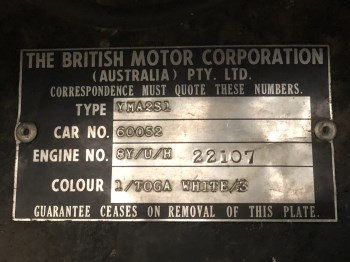 Reverse stamped identification plate