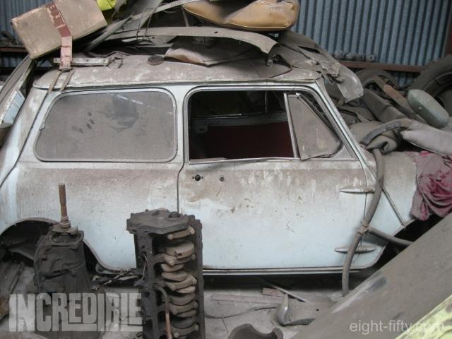 Where the Mini Minor spent decades stored, covered in parts from other vehicles (image: Elders).