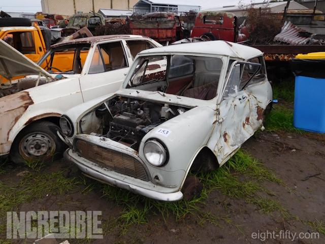 Sitting at the end of one of many rows, the Mini Minor awaits sale at auction in June 2016.